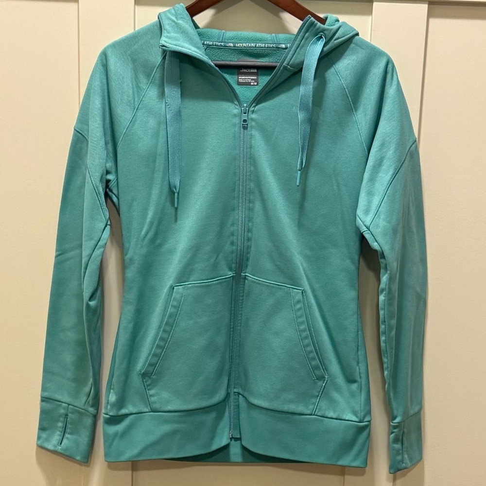 The North Face women’s teal Zip-Up Hoodie